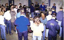 A spill and safety briefing at a major oil spill.