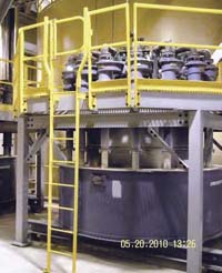 Raised platform with protected guardrail.