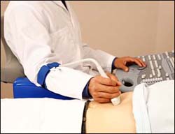 Operator has wrist and forearm supported, hand comfortably draped around the transducer, and cable brace in use reducing the torque on wrist.