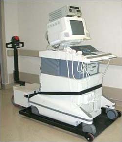 A powered assist device can assist with movement of heavy equipment.