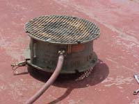 Figure 16: Corpus blower with proper guards and grounded with alligator clip ventilating fuel tank