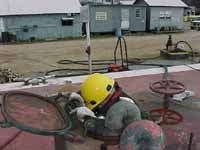 Figure 20: Entering fuel barge tank