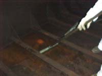 Figure 23: Squeeging product in tank to one area for suction