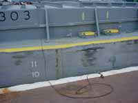 Figure 4: Barge grounding clamp and cable