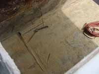 Figure 9: Brooms and hoses in barge hold