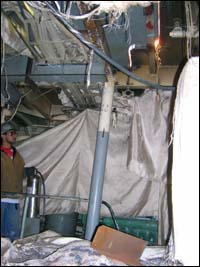 Fire retardant covers on pipes used to protect against sparks from hot work.