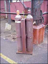 Gas cylinder holder located in the shipyard.
