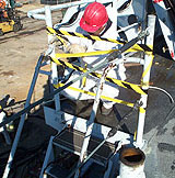 Figure 5: Unsafe ladder being marked with barrier tape
