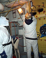 Figure 17: Burner wearing ear muffs