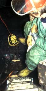 Combustible residues in lower hull compartment