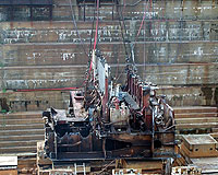 Figure 7: Load properly attached to crane using chain and wire rope slings, connected by shackles