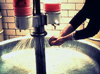 Figure 11: Worker using washing facilities