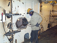 Figure 4: Removal of torches and hoses.