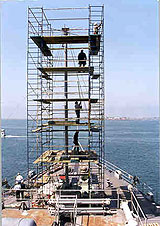 Figure 3: Metal pole scaffold being properly erected