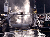 Figure 1: Temporary lighting used during night ship repair operations.