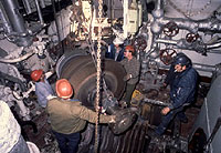 Figure 7: Workers removing main shaft gear