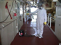 Figure 6: Workers protected from toxic cleaning solvents