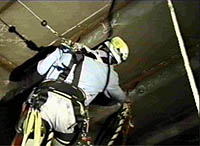 Figure 2: Worker protected with a retractable lifeline and body harness