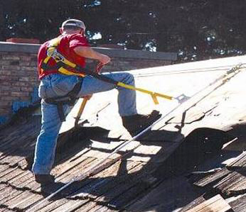 An example of a Personal Fall Arrest System in use during reroofing.