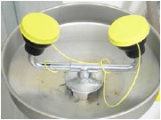Eyewash with protective covers.