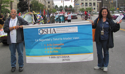 OSHA Compliance Safety and Health Officers Wilson Soto and Clara Marin at the 10th Annual Puerto Rican and Hispanic Day Parade in Buffalo, NY.