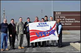 U.S. Army Corps of Engineers Louisville District Office staff holding VPP flag