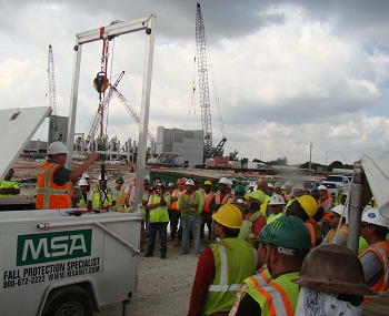 One hundred fifty workers with Balfour Beatty Construction learn about fall prevention at safety stand-down.