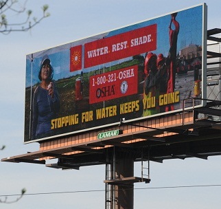 Heat Illness Prevention Campaign billboard. Water. Rest. Shade. 1-800-321-OSHA. OSHA. Stopping for water keeps you going.