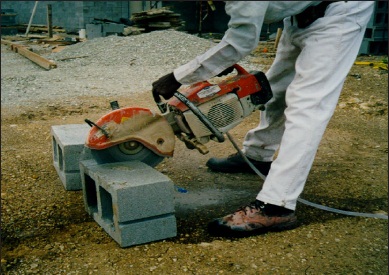 Masonry saw uses water to control silica dust