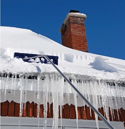 Safely removing snow from rooftops