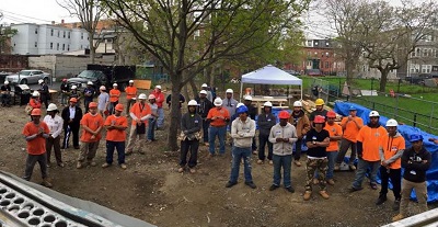 On Tuesday, May 5, 2015, Youth Build Boston, Madison Park High School and the New England Regional Council of Carpenters Training Fund held a two-hour fall safety stand-down that consisted of hands on demonstrations at the construction site of a single family home being built in Roxbury, Mass