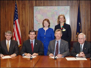 Front row L-R: Ben Cooper, Graphic Arts Technical Foundation/Printing Industries of America; OSHA's then-Assistant Secretary, John Henshaw; Michael Robertson, Specialty Graphic Imaging Association; Richard H. Dunnington, Gravure Association of America, Inc. Back row L-R: Danielle Waterfield, Specialty Graphic Imaging Association; Marci Kinter, Specialty Graphic Imaging Association.
