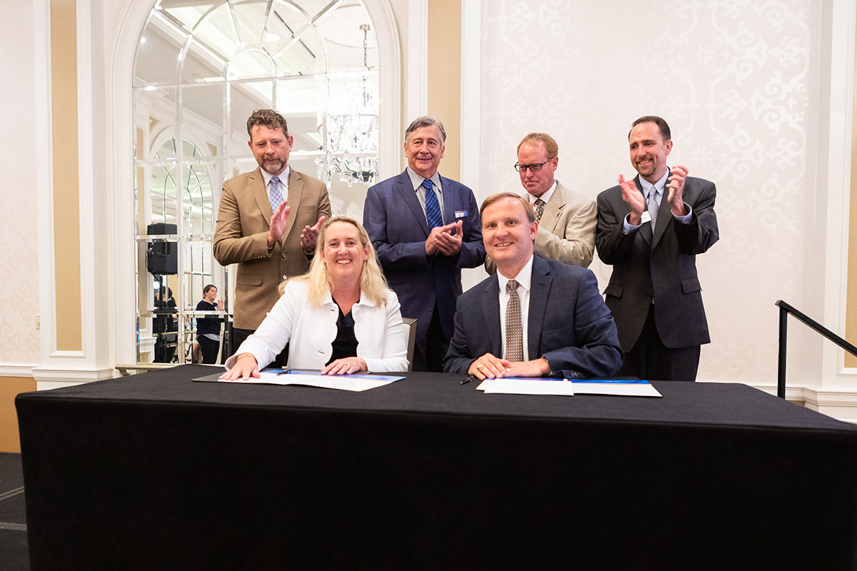 Loren Sweatt, Deputy Assistant Secretary, DOL-OSHA and Corey Rosenbusch, President and CEO, GCCA (both seated), with GCCA representatives at the Alliance renewal signing ceremony on July 31, 2019.