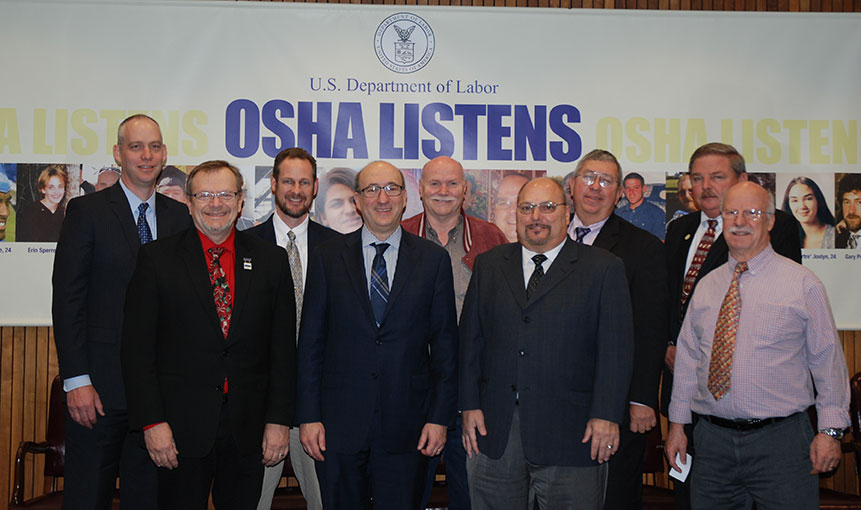 then-Assistant Secretary Dr. David Michaels, with representatives of IEC at the alliance renewal signing ceremony on December 7, 2015.