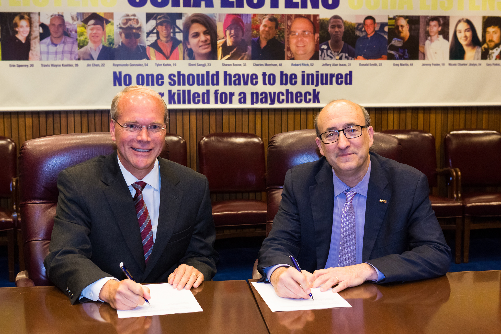 Brett Wood, ITA Chairman and President & CEO, Toyota Material Handling North America, with then-Assistant Secretary Dr. David Michaels, USDOL-OSHA, at a ceremonial alliance signing event on June 13, 2016.