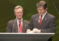 OSHA's then-Assistant Secretary, John Henshaw, and NSC's President and CEO, Alan McMillan, sign national Alliance