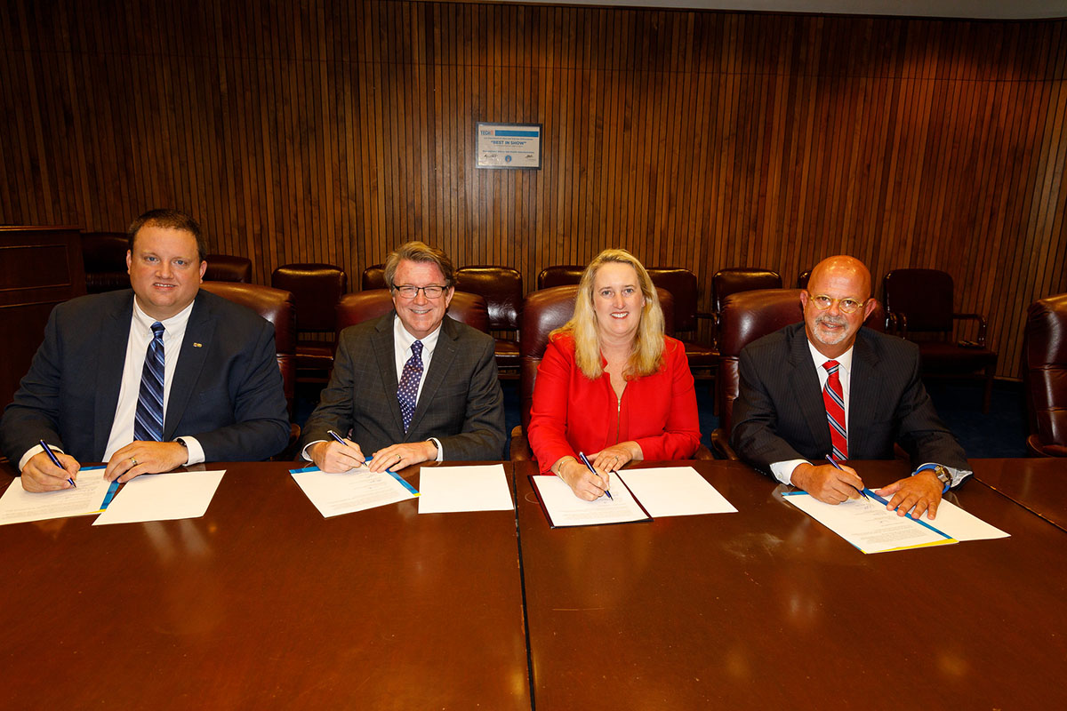 Principle Deputy Assistant Secretary Loren Sweatt, USDOL-OSHA, USPOULTRY Director for Human Resources & Safety Programs Matt Spencer (left), NTF President and CEO Joel Brandenberger (2nd from left), and NCC President Mike Brown (right).