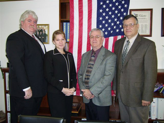 (left to right) John E. Slevin, Chairman, ABC-CT Safety Committee; Lelah M. Campo, President, ABC-CT; Thomas Guilmartin, Area Director, OSHA's Hartford Area Office and Robert W. Kowalski, Area Director, OSHA's Bridgeport Area Office pose after signing the Alliance agreement.