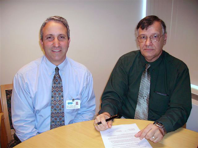 (left to right) David Maffei, Program Director, Griffin Hospital Occupational Medicine Center and OSHA's Bridgeport Area Office Director Robert W. Kowalski pose after signing the Alliance agreement.