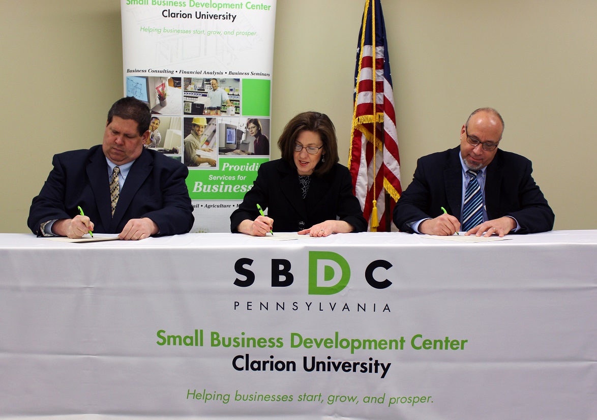 Brendan Claybaugh, Area Director, DOL-OSHA Erie Area Office; Cindy Nellis, Director, Clarion University, SBDC; and Sam Gualardo, Program Director, PA OSHA Consultation Service at the signing ceremony on February 13, 2018.