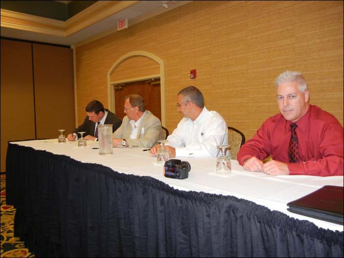 (Seated L to R) Kent Crytzer, Co-Chair, Cleveland Safety Forum; Don Mays, Co-Chair, Cleveland Safety Forum and Union Safety Representative; William Hocevar, Co-Chair, Cleveland Safety Forum; and Howard Eberts, Area Director, Region V, Cleveland Area Office, USDOL-OSHA. The Cleveland Safety Forum Alliance signing on June 19, 2012.