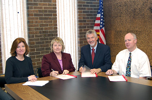 (L to R) Nancy Hauter, CAS, Region V, Chicago North, Illinois Area Office, USDOL-OSHA; Diane Turek, Area Director, Region V, Chicago North, Illinois Area Office, USDOL-OSHA; Lyle Ehlers, President, LCCA; and Fred Rodheim, Safety Committee Chairman, LCCA.