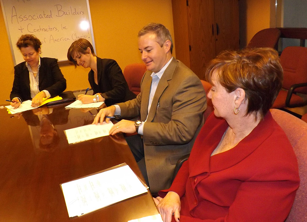 (L to R): Marcia P. Drumm, Acting Regional Administrator, OSHA; Michele Roberts-Bauer, ABC President; Paul Cohen, Cretcher Heartland, LLC, 2014 ABC Safety Committee Chair; and Barbara Theriot, Area Director, OSHA, at the alliance signing on January 15, 2015.