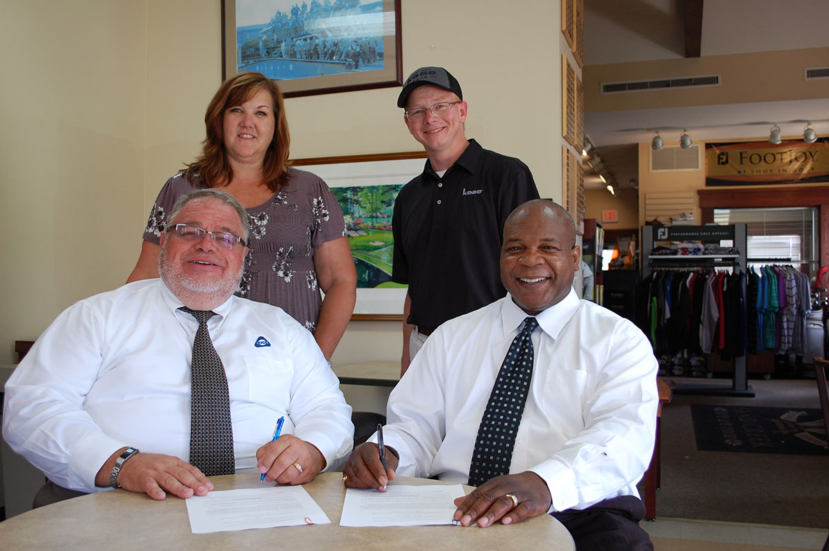 Seated: Lonnie W. Glen, GEAPS Great Plains Chapter President and Larry O. Davidson, Sr. , Area Director, Wichita Area Office.  Standing: Barbara Grove, GEAPS Great Plains Chapter Past President and Steve Reed, GEAPS Great Plains Chapter Director