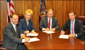 (L to R) Pete Diakun, NSRP Executive Control Board Member; Cynthia Brown, then-President, ASA; Jordan Barab, Deputy Assistant Secretary, USDOL-OSHA; and Ian Bennitt, Manager, Government Affairs, SCA; at the OSHA and Shipbuilding Group National Alliance signing on September 14, 2010.