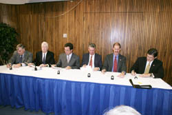 Leaders of the Roadway Work Zone Safety and Health Coalition sign an Alliance agreement with OSHA's then-Assistant Secretary John Henshaw.