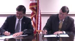 Signing from left to right is: John L. Henshaw, former Assistant Secretary of Labor, Occupational Safety and Health Administration and Geoffrey G. Prosch, Principal Deputy Assistant Secretary of the Army (Installations and Environment) Designated Agency Safety and Health Official (DASHO)