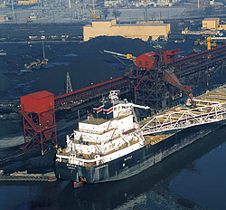 At its bulk-loading terminals, Koch Carbon can load and unload ocean vessels, barges, rail cars and trucks and can also blend, dry, screen or crush material for customers. This facility, located near Chicago on the Calumet River, has more than 1 million tons of storage capacity and handles 4.5 million tons of cargo each year, including various grades of coal and petroleum coke, as well as gypsum, salt, fertilizer and other dry bulk materials.
