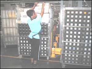 Before - Overloading containers results in forceful lifting above the head