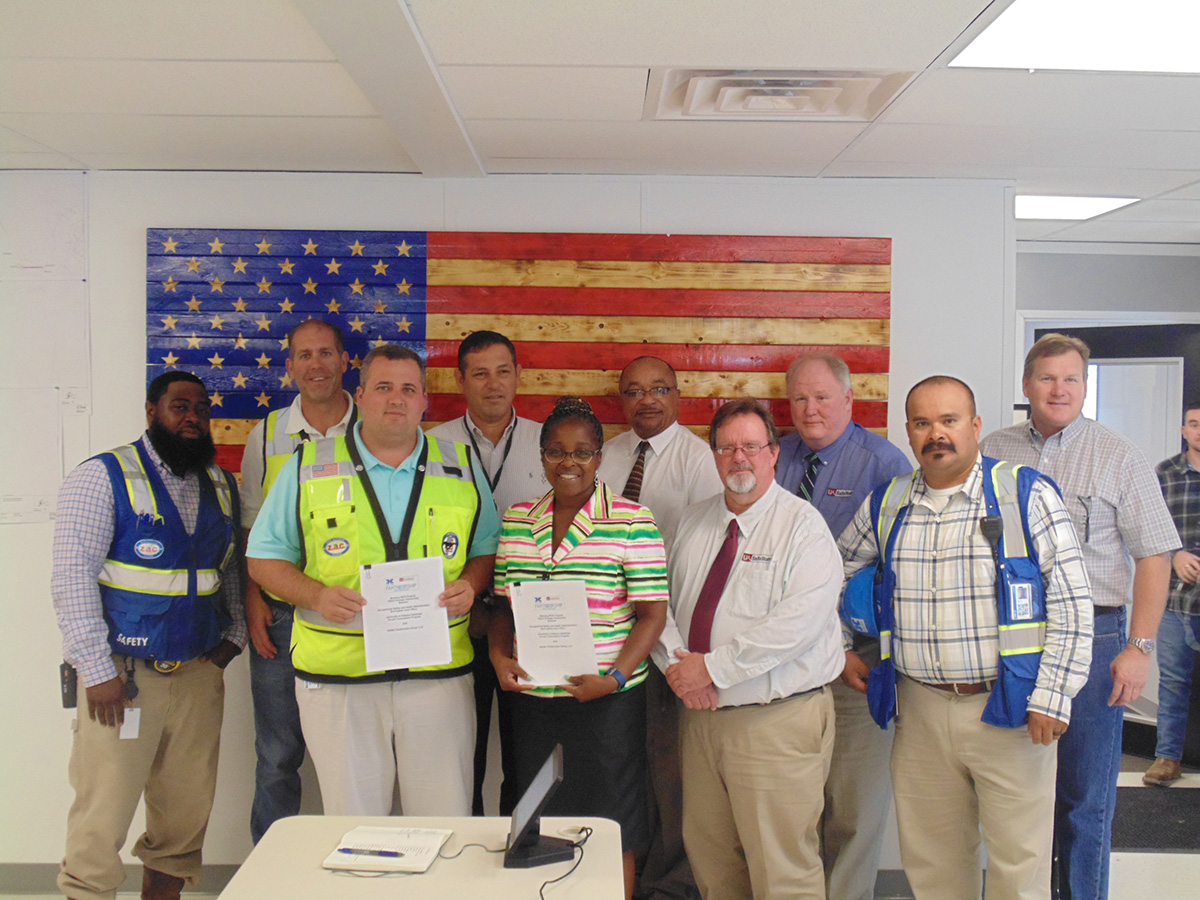 From Left to right: Mr. Rodney Cook (Holder Construction Group, LLC- Senior Safety Coordinator), Mr. Chris Paine (Holder-Senior Superintendent), Mr. Corey M. Lemming (Holder- Senior Project Manager), Mr. Jorge Cisneros (Holder- Corporate Safety Director), Mrs. Ramona Morris ( Birmingham OSHA Office Area Director), Mr. Hector Julian-Camacho (Birmingham OSHA Office Assistant Area Director), Mr. Matt Hollub (University of Alabama - SafeState, On-Site Consultation Program), Mr. Randy M. Easterling (University of Alabama - SafeState, Safety Program Supervisor), Mr. Marco Polo Chantres (Holder- Safety Director), Mr. John P. Redmond (Holder- Vice President).